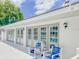 Pool with chairs and white trimmed doors at 222 Carpenters Way # 65, Lakeland, FL 33805