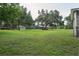 Expansive backyard with mature trees, offering plenty of space for recreation and outdoor activities at 2331 D R Bryant Rd, Lakeland, FL 33810