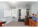 Well-lit bedroom featuring neutral paint, carpeted floors, closet and access to another room at 2331 D R Bryant Rd, Lakeland, FL 33810