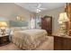 Comfortable bedroom featuring carpet flooring, neutral wall color, and window with blinds at 2593 Colonel Ford Dr, Lakeland, FL 33813