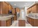 Kitchen features granite countertops, stainless steel appliances, and ample counter space at 2593 Colonel Ford Dr, Lakeland, FL 33813