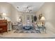 Cozy living room with comfortable seating, tile floors, and a view to the outdoor patio, perfect for relaxing at 2593 Colonel Ford Dr, Lakeland, FL 33813