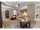 Open-concept living room with ceiling fan, comfortable seating, and view into other rooms at 2593 Colonel Ford Dr, Lakeland, FL 33813