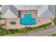 Overhead view of community pool, hot tub, and sunbathing areas highlighting the outdoor amenities at 3261 Fish Hawk Dr, Polk City, FL 33868