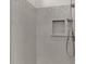 Contemporary shower featuring a convenient corner niche and a handheld shower fixture at 3261 Fish Hawk Dr, Polk City, FL 33868