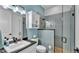 Modern bathroom featuring a glass-enclosed shower, contemporary vanity, and stylish fixtures at 3287 Red Tail Hawk Dr, Polk City, FL 33868