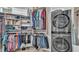 Large closet featuring shelves and a laundry area with a stackable washer and dryer at 3287 Red Tail Hawk Dr, Polk City, FL 33868