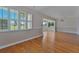 Open dining area filled with natural light, featuring elegant white plantation shutters on the windows at 3487 Highland Fairways Blvd, Lakeland, FL 33810