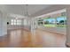 Bright dining area featuring large windows and a view of the backyard at 3487 Highland Fairways Blvd, Lakeland, FL 33810