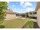 A nice backyard with patio, outdoor fire pit and screened-in porch at 3568 Jade Ln, Mulberry, FL 33860
