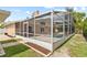 The screened pool, patio, and yard combine to create outdoor enjoyment at 3568 Jade Ln, Mulberry, FL 33860