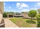 Spacious backyard featuring green space, covered sitting area and plenty of space for parking at 3568 Jade Ln, Mulberry, FL 33860