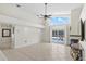 A bright living room with pool views and a fireplace at 3568 Jade Ln, Mulberry, FL 33860