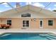 Inviting screened pool area with seating offers a relaxing outdoor space at 3568 Jade Ln, Mulberry, FL 33860