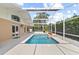 The screened pool area is perfect for outdoor enjoyment with a water feature and plants at 3568 Jade Ln, Mulberry, FL 33860