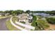 Home featuring an RV garage, an outdoor entertainment area, and a fenced yard at 3568 Jade Ln, Mulberry, FL 33860