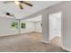 Spacious living room with carpet flooring and plenty of natural light flowing in from large windows at 3601 Avenue R Nw, Winter Haven, FL 33881