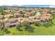 Expansive aerial view of a residential neighborhood featuring well-maintained lawns and diverse home styles at 3980 Sunset Lake Dr, Lakeland, FL 33810