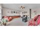 Bright bonus room with built-ins and comfortable seating options at 3980 Sunset Lake Dr, Lakeland, FL 33810