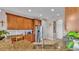 Bright kitchen with granite counters, stainless appliances, wood cabinets, and a view to the front yard at 3980 Sunset Lake Dr, Lakeland, FL 33810