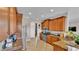 Traditional style kitchen with granite countertops, stainless steel appliances, and tile floors at 3980 Sunset Lake Dr, Lakeland, FL 33810