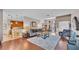 Open-concept living area seamlessly connecting the living room, kitchen, and dining spaces at 3980 Sunset Lake Dr, Lakeland, FL 33810