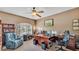 Spacious home office with large arched window, lots of desk space and comfortable seating for a productive work environment at 3980 Sunset Lake Dr, Lakeland, FL 33810