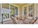 Charming outdoor patio with a dining set, great for entertaining or relaxation at 3980 Sunset Lake Dr, Lakeland, FL 33810