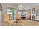 Cozy sitting area featuring comfortable chairs and a chess table, perfect for relaxation at 3980 Sunset Lake Dr, Lakeland, FL 33810