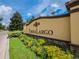 Entrance to Terra Largo community featuring lush landscaping and decorative signage at 4125 Prima Lago Cir, Lakeland, FL 33810