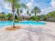Community pool showcasing a large pool area with a clubhouse and plenty of seating at 4125 Prima Lago Cir, Lakeland, FL 33810