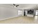 Open-concept living space showcasing the living room, dining area, and kitchen at 4125 Prima Lago Cir, Lakeland, FL 33810