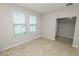 Bright room with tiled flooring, large windows, and neutral wall paint at 4125 Prima Lago Cir, Lakeland, FL 33810