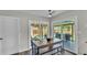 Dining area with natural light that leads to covered outdoor space and backyard at 416 Bayou Rd, Winter Haven, FL 33884