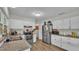 Functional kitchen with stainless steel appliances and white cabinets at 416 Bayou Rd, Winter Haven, FL 33884