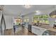 Bright kitchen with stainless steel appliances, eat-in area and natural light at 416 Bayou Rd, Winter Haven, FL 33884
