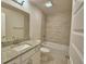 Bathroom featuring granite countertops, a tiled shower, and a bathtub at 4306 Juliana Lake Dr, Auburndale, FL 33823