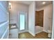 Bathroom featuring wood-look floors, granite counters, and a tub and shower combination at 4312 Juliana Lake Dr, Auburndale, FL 33823