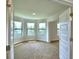 Inviting bedroom with a bay window, plush carpeting and natural light streaming through windows at 4312 Juliana Lake Dr, Auburndale, FL 33823