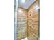 Modern walk-in shower featuring neutral tile walls and brushed nickel fixtures at 4312 Juliana Lake Dr, Auburndale, FL 33823