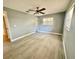 Spacious bedroom with wood-look floors and natural light at 4535 Weston Ct, Bartow, FL 33830