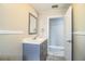 Stylish bathroom with gray vanity, beadboard paneling, and modern fixtures, offering a clean and inviting space at 4629 Harden Blvd, Lakeland, FL 33813