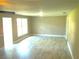 A spacious living room featuring neutral walls and modern flooring at 4629 Harden Blvd, Lakeland, FL 33813