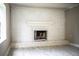 Living room featuring a white-painted brick fireplace and marbled floors at 4629 Harden Blvd, Lakeland, FL 33813