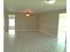 Open living room featuring new flooring, neutral color scheme, and open floorplan at 4629 Harden Blvd, Lakeland, FL 33813
