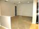 A living room with neutral walls, beige carpet, and a ceiling fan at 5070 Ironwood Trl, Bartow, FL 33830