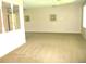 Neutral living room with plush carpeting and ceiling fan at 5070 Ironwood Trl, Bartow, FL 33830