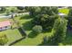 Aerial view of a spacious lot featuring mature trees and a partially fenced in area at 5140 Alderman Rd, Lakeland, FL 33810