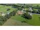 Expansive property with lush greenery, ponds, and scattered houses creates a serene and private setting at 5140 Alderman Rd, Lakeland, FL 33810