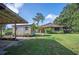 Expansive backyard with a shed and a house at 5140 Alderman Rd, Lakeland, FL 33810
